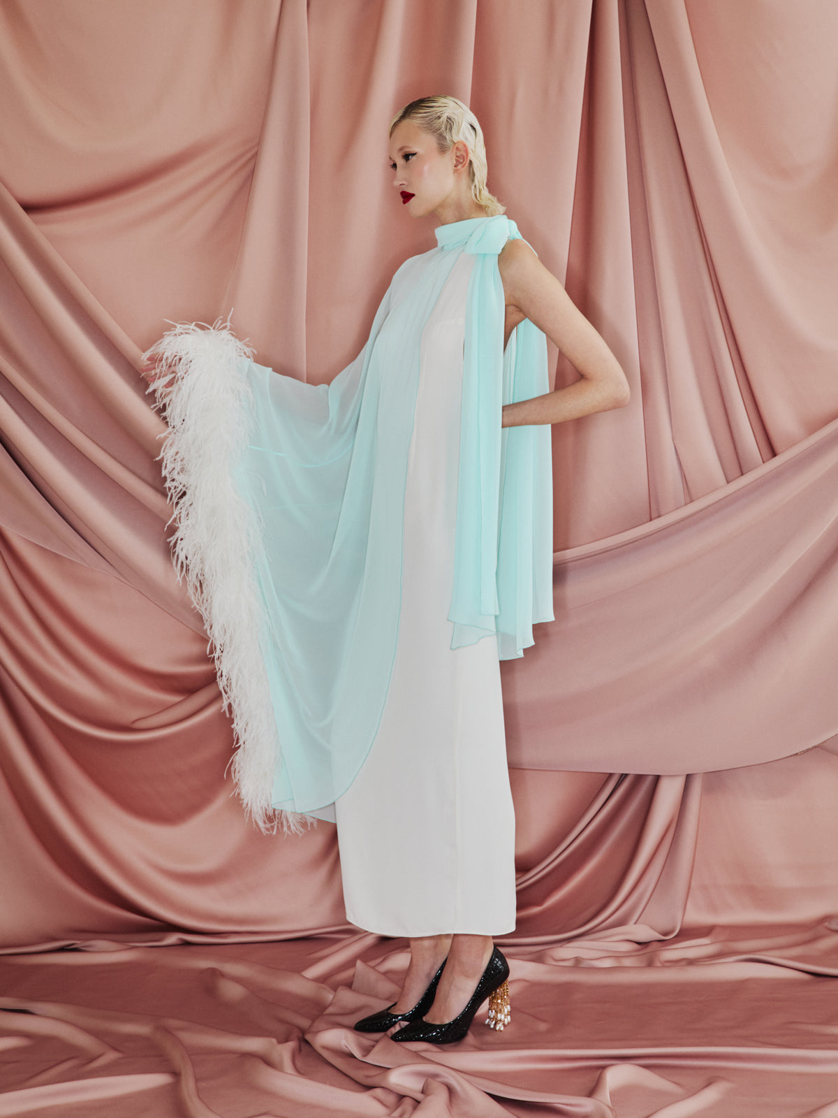 AMEN black chiffon and georgette long dress with sheer cape construction and ostrich feather trim back view