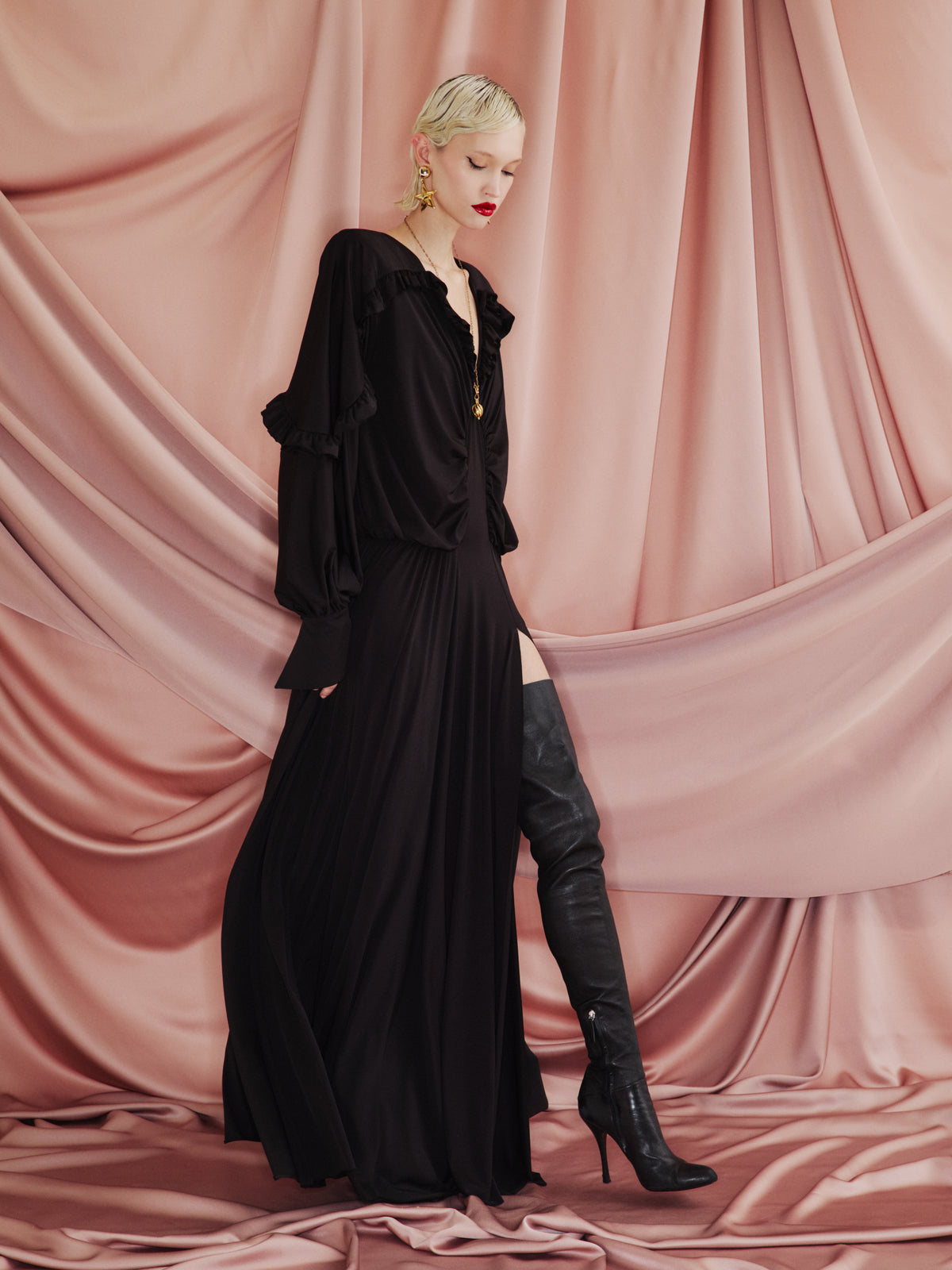 AMEN burgundy chiffon long dress with deep V neckline, ruffle detailing, semi-sheer sleeves and high front slit front view