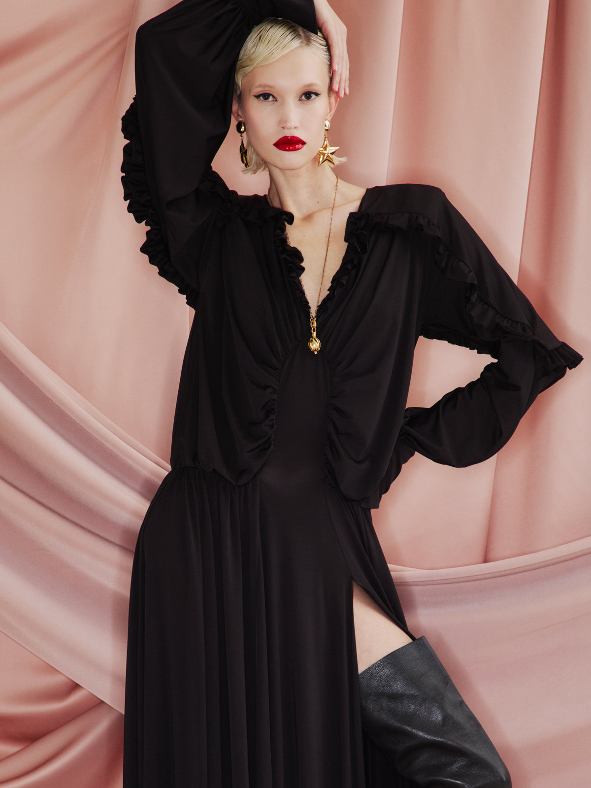 AMEN burgundy chiffon long dress with deep V neckline, ruffle detailing, semi-sheer sleeves and high front slit front view
